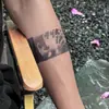 Pegatina de tatuaje de pulsera estilo chino, diseño de carpa y flor de loto con llamas, tatuaje temporal realista impermeable para decoración del brazo