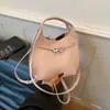 Bolso tipo cubo minimalista de alta gama para mujer, nuevo modelo de moda 2025, versátil, de nicho, para llevar al hombro o cruzado, elegante bolso de mano para commuting