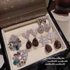 Brincos de Pedra Preciosa Roxo Pavão em Forma de Gota de Água Sotheby's Brincos de Zircônio Meteoro Olho de Gato em Forma de Ovo com um Toque de Luxo Leve e de Alta Qualidade