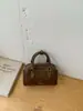 Bolsa de Bowling Portátil al por Mayor Transfronteriza para Mujer 2026 Primavera Nueva Moda Casual Bolso de Hombro Cruzado Bolso Almohada