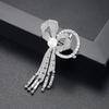 Broche de lazo de diamantes Jinse para mujer, con microincrustaciones de cobre y circonita, accesorio de moda coreana para banquetes.