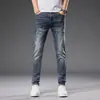 Dropshipping de Roupas Masculinas Xintang 2026 Estilo Coreano Slim Fit Stretch Versátil Verão Jeans Masculino Fino