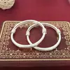 Plata de ley S999 bebé bebé pulsera de plata de ley cerradura de larga vida femenina redonda brillante panza enrollada Pulsera para niños bebés Hombres y mujeres