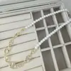 Diseño retro estilo japonés collar de perlas nariz de cerdo temperamento femenino nicho alta calidad personalidad única cadena para la clavícula versátil