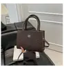 Outono 2025 Design Casual Moda Casual Casual Padrão Tecido Retro Portátil Ombro Transversal Pequena Bolsa Quadrada Mulheres