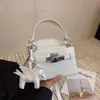 Bolso de Mano Transfronterizo 2025 Nueva Moda Bolso de Hombro Bandolera para Mujer Diseño Nicho de Alta Gama Bolso Kelly para Viaje
