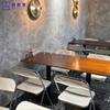 Restaurante de estilo retro con temática de té, mesa de comedor de madera maciza, cafetería de estilo industrial, tienda de té con leche y barbacoa, mesas y sillas de acero inoxidable.