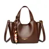Bolso Cubo Retro de Alta Gama para Comercio Exterior para Mujer Otoño/Invierno 2026 Nuevo Bolso de Mano Versátil Casual Bolso de Hombro Cruzado