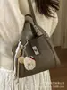 Bolso de Mano de Alta Gama para Mujer 2026 Nuevo Bolso Cruzado Versátil de Moda Super Popular Bolso Pequeño Tote Tipo Cubo