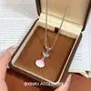 Delicado Collar con Colgante de Concha Rosa y Lazo, Aspecto de Alta Gama, Estilo Exquisito de Vacaciones en la Costa, Cadena Versátil y Delicada para la Clavícula