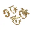 Juego de cuatro anillos vintage de estrella de mar y concha en oro mate y plata, anillos abiertos ajustables versátiles para vacaciones junto al mar, en stock