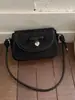 2026 Nueva Bolsa para Mujer Moderna de Viaje Diaria Bolso de Hombro Diseño de Nicho Lazo Bolso Cruzado Pequeño Cuadrado para Viajes