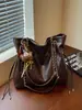 Bolso de moda estilo coreano para mujer, nuevo modelo 2026 para el uso diario, bolso cruzado simple de color sólido, bolso de cadena de gran capacidad, bolso de hombro