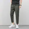 Calças de seda de gelo Masculino 2023 Verão fino Moda Marca de secagem rápida respirável calças casuais Masculino verão moda Tornozelo-comprimento calças