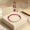Pulseira de fio vermelho com sete contas, com três contas douradas e quatro prateadas, ajustável, nova joia de bênção estilo chinês para homens e mulheres, também adequada como tornozeleira