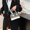 2024 Invierno Elegante Bolso Concha Nuevo Moderno Casual Ins Hombro Cruzado Costuras Estampado Leopardo Moda Textil Bolso de Mujer