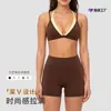 Nuevo traje deportivo bicolor para mujer, a prueba de impactos, de soporte, transpirable, sujetador deportivo y shorts de yoga de dos piezas falsos