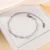Pulseira Cruzada Nova para Senhoras em Aço Titânio Coração Vazado Moda Versátil Empilhável Ajustável em Aço Inoxidável Joia para Mão Atacado