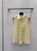 Suministro Directo Nanyou Verano 2026 Traje de Temperamento que Reduce la Edad con Bloques de Color y Bordado de Letras Top Irregular Elegante + Falda Larga