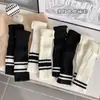Zapatos y calcetines: Calcetines apilados de color liso para mujer, otoño e invierno, estilo universitario, calentadores de piernas de lana tejidos de moda, calcetines cálidos para protección de piernas