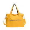 Bolso tote de gran capacidad de alta gama para mujer para otoño e invierno, nuevo modelo 2026, bolso de hombro de color liso con letras