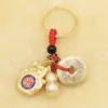 Llavero de monedas de cinco emperadores de cobre real accesorios de aleación gato manzana candado carácter de bendición de calabaza abierta colgante de joyería colgante