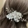 Acessórios de cabelo de noiva mais vendidos transfronteiriços, tiara de flor de pérola, pente de cabelo feito à mão, conjunto de grampos e palitos de cabelo para fotografia de viagem de casamento