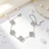 Pulseira de aço titânio trevo de quatro folhas mais vendida transfronteiriça para mulheres, microincrustada com zircônia, pulseira de moda de luxo leve japonesa e coreana, atacado de luxo leve