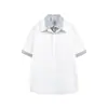 Yidao Vintage 2026 Verano Nuevo Estilo Americano Moderno Rayas Diseño de Patchwork Falso Dos Piezas Camisa Holgada de Manga Corta para Hombre