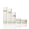 Novos produtos de cuidados com a pele de garrafa de vidro de padrão vertical de diamante elegante de alta qualidade terno frasco de creme de loção de água sub-garrafa de cosméticos