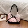 Moda Estilo Coreano Chic para o Trabalho Fresco 2026 Nova Bolsa de Ombro Único com Laço de Pérola de Grande Capacidade