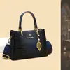 Bolso de Maternidad de Moda Simple con Sentido Avanzado Nuevo Bolso de Hombro Cruzado Versátil Diseño de Nicho Bolso de Mujer de PU