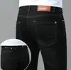 Jeans Blancos de Alta Gama Estilo Europeo a Prueba de Tres Elementos para Hombre, Corte Delgado, Elásticos, Pantalones Cónicos, Versión Forrada de Felpa Otoño e Invierno 2026, Cálidos