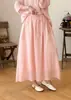 Saia Feminina Verão 2026 Estilo Mori Girl Japonês Cor Sólida Ráfia Cintura Elástica Cordão Solta Oversized Venda por Atacado