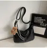 Bolsa Transversal Vintage com Design Único para Mulheres 2026 Nova Versão Coreana Bolsa Tote Fashionável Versátil Grande Capacidade Bolsa de Ombro