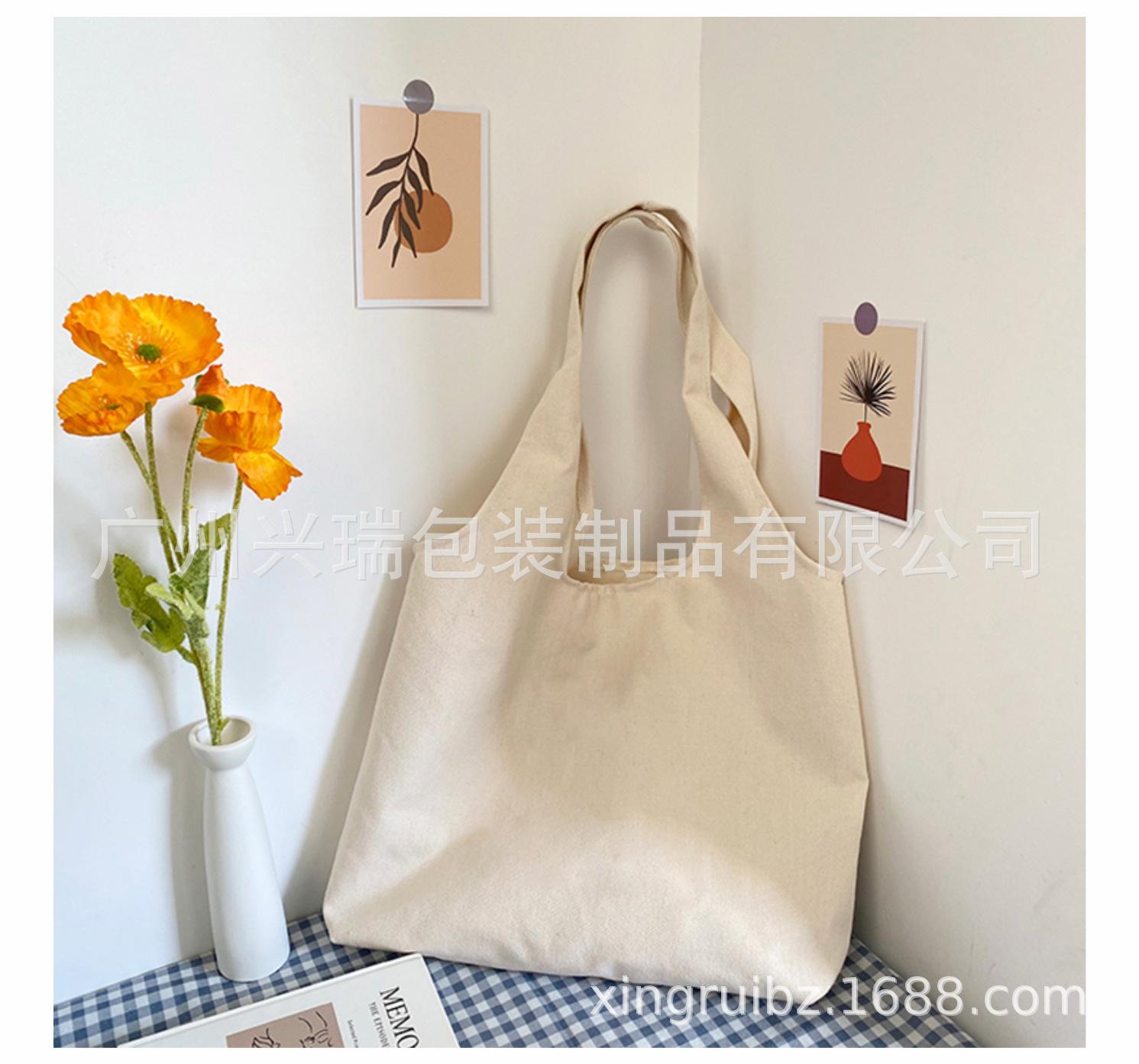 新款上课大学生小众单肩帆布包_07.jpg