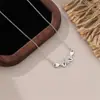 Collar Colgante Doble Ala en Forma de Corazón para Mujer, Temperamento de Lujo Ligero, Moda Única 2025 Nuevo Diseño Microincrustado Cadena de Clavícula de Nicho