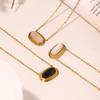 Collar con colgante Xinyixin Europa y Estados Unidos transfronterizo viento ins geométrico acero inoxidable incrustación ágata negra chapado oro real 18K joyería