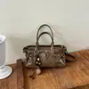 Bolso de mano vintage de alta gama transfronterizo 2026 modelo nuevo bolso de gran capacidad bolso simple de hombro cruzado