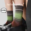 Calcetines de punto para aficionados otoño e invierno nuevo color block rayas degradadas de moda calcetines coreanos ins de algodón sin costuras calcetines de media pantorrilla para mujer