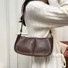 Bolso de mano brillante con brillo metálico para mujer 2026 verano nuevo celebridad de internet de moda bolso de axila de un solo hombro bolso cruzado de moda