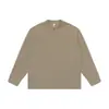 2026 nueva camiseta casual de manga larga para hombre con cuello redondo, estilo japonés retro de color liso con botones texturizados, moderna