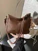 Bolso de Cubo Retro Transfronterizo para Mujer 2026 Nueva Moda Bolso de Hombro Sencillo de Nicho Versátil para Viajes Cotidianos Bolso Cruzado