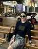 Top Feminino Gola Alta Canelado de Algodão com Manga Longa, Slim Fit, Lançamento de Verão, Fornecimento Direto da Fábrica, Adequado como Camada Base