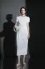 Vestido Casual de Moda Nueva de Verano con Cuello Redondo de Longitud Media 2026 Nuevo Estilo Diseño de Pliegues Retorcidos Adelgazante Ceñido a la Cintura Tridimensional Vestido Largo