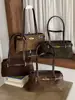 Bolso de hombro transfronterizo para mujer, bolso de mano casual con nuevo diseño de nicho, elegante bolso de gran capacidad estilo coreano para mujer