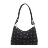 La popular bolsa de mano para dumplings de estilo fresco de este año para mujer, nuevo modelo de otoño 2026, elegante bolso de hombro con lazo, bolso de moda para el antebrazo