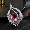 Broche de lujo de la industria pesada con alas de fénix, elegante y noble, con circonitas, accesorios de abrigo, joyería de ramillete de alta gama.