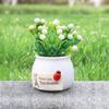 Plantas de flores artificiales creativas de gran venta, macetas de frutos auspiciosos, soporte para perfume de coche, bálsamo de aromaterapia, adornos florales para coche