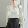 Tiro real 2025 camisa de satén color albaricoque francés diseño de primavera para mujer top ajustado de temperamento chic